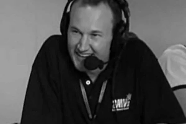 Clinton Grybas in a commentator's headset