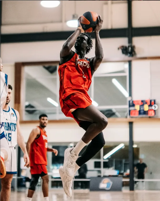 A Venom player rising for a shot in a VBL game