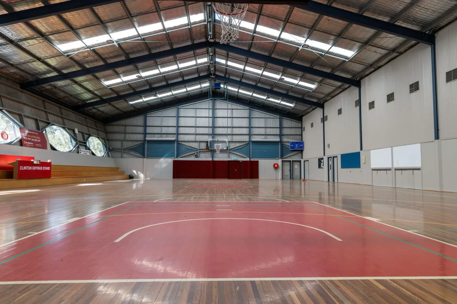 Inside Warrandyte Sports Complex: the timber court with its red key under the high roof